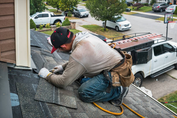 Professional Emergency Roof Repair technician working in New Castle, NH